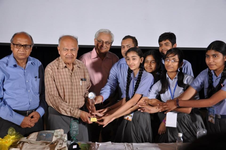 Students receiving award from Padam Vibhushan Dr. Jayant V. Narilar (eminent astrophysicist) during National Conference on Space-2013